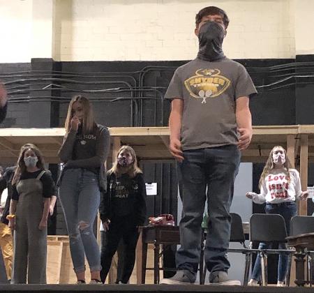 SHS theatre students (l-r) Isabel Rocha, Allie Beck, Shelby Powell, Brendan Mitchell and Gillian Crist did vocal warmups as a group before beginning rehearsal.