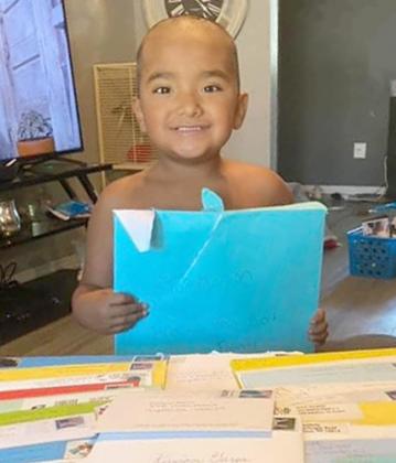 Kaison Garza with some of the birthday cards he received.