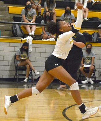 Snyder senior Kamiah Davis made an over-the-shoulder hit during a 3-0 loss to Brownwood at Tiger Gym Friday. Davis finished with 6 kills, 6 digs and 8 assists.