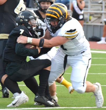 Snyder senior Nathan Beaver (right) dragged down a Lamesa ballcarrier. Beaver finished with a forced fumble and a fumble recovery, as well as a pair of tackles for loss