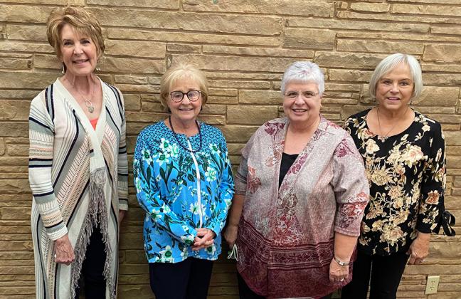 Becky Armstrong (left) led a book review during this month’s Atheneum Study Club meeting. Armstrong is pictured with hostesses (l-r) Linda Greene, Zelma Irons and Kathleen Baker.