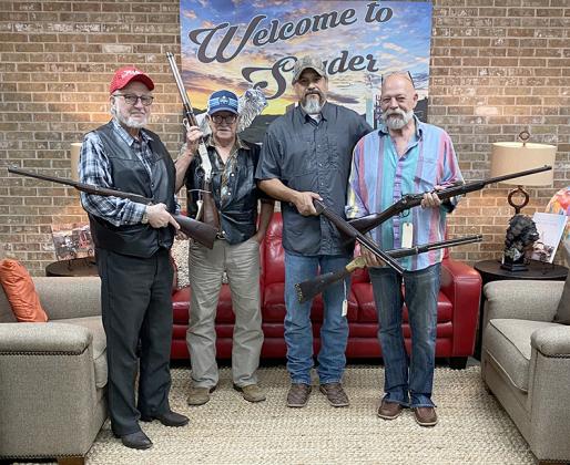 Wendell Grangaard, Ernie Fellows, Dave Molina and Nicholas Tooth showed rifles recovered from Custer’s Last Stand.