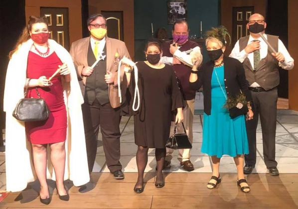 Clue: On Stage cast members (l-r) Kaylee Rush, Glenn Burns, Stacy Haley, Clark Reed, Nancy Harris and Chad Goebel posed with their characters’ weapons at the Ritz Community Theatre before the Sunday matinee.  Clue continues at 7 p.m. Thursday-Saturday and at 2 p.m. Sunday.