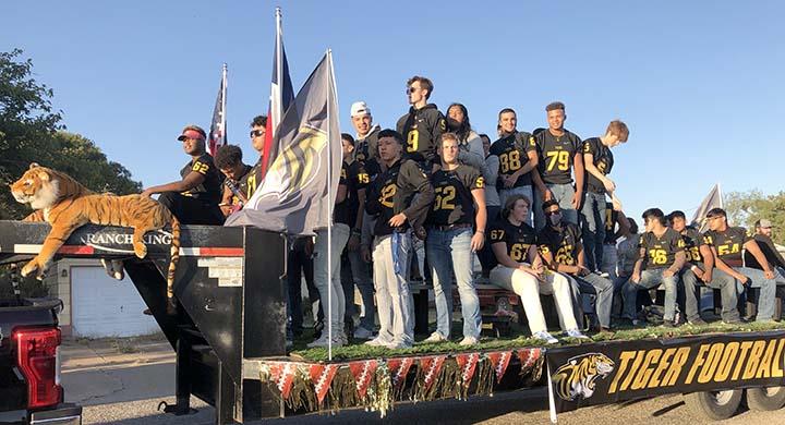 The Snyder High School football team rode on a float.