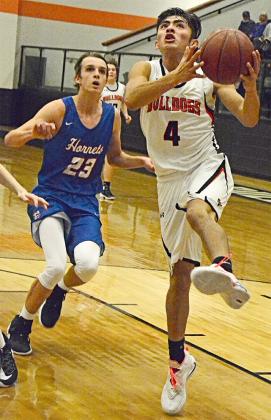 Ira freshman Demitri Juarez leaped for a layup during the Bulldogs’ 40-34 win over Highland on Tuesday.