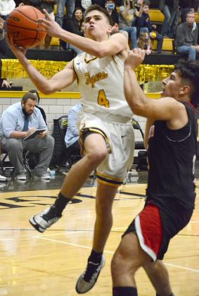nyder junior Hunter Stewart leaped for a layup during the Tigers’ 46-41 win over Levelland on Friday