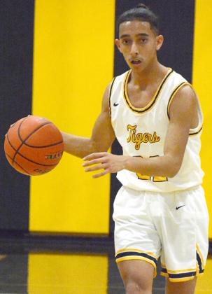 Snyder senior Michael Jaramillo scored 20 points in the Tigers’ win over Sweetwater on Friday. Jaramillo is one of four seniors on the Tigers’ squad.