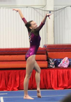 Snyder Junior High School student Megan Wiggins competed at a Phoenix, Ariz. gymnastics meet on Feb. 12.
