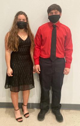 Carolyn Stelluti (left) and Chris Moreno posed together after receiving their superior ratings at the region solo and ensemble competition.