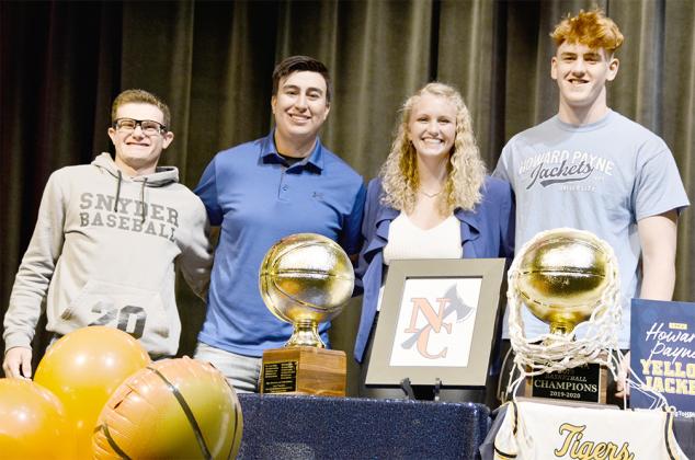 Snyder High School seniors (l-r) Blaine House, Leeroy Tavarez, Hayley Humphrey and Zach Miller signed letters of intent to continue their athletic careers at the collegiate level on Monday.