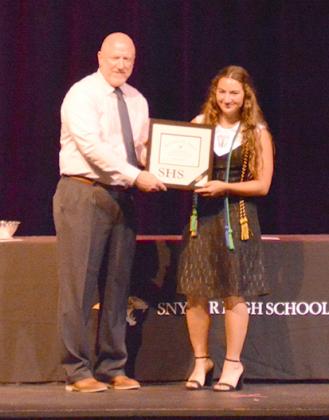Snyder High School principal Shaye Murphy (left) presented the salutatorian award to senior Carolyn Stelluti.
