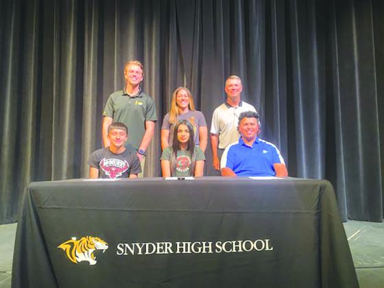 Contributed Photo pictured are the signing day participants. On the bottom row are (l-r) are Antonio Martinez, Jocelyn Ornelas and Aden Hernandez. On the top row are Head cross-country coach Jaden Cowley, Head Lady Tigers' soccer coach Jessica Lima and Head golf coach Ricky Hunter.