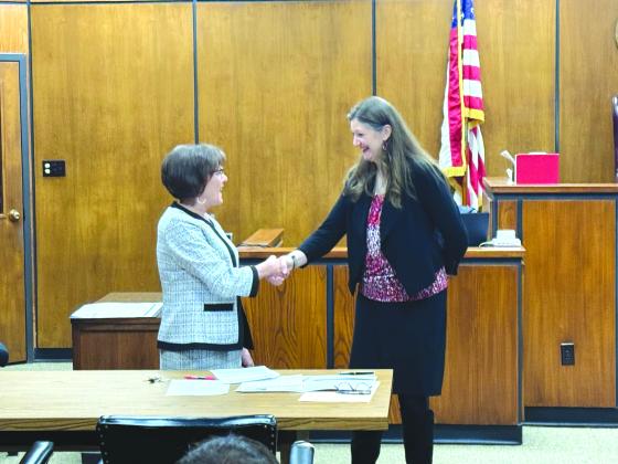 TSN Photo/ Chad Goebel 132nd District Judge Dana Cooley swore in Lana Warr Monday evening. Warr will serve as District Clerk running unopposed in the upcoming May elections. 