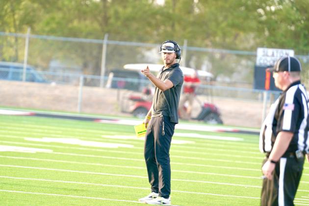 Special Thank You to Valerie Morris/Snyder ISD  Wes Wood coaches the Snyder football team during its game against Slaton on Aug. 25, 2023, in Slaton. Wood, the head coach of the Tigers since 2019, was hired to coach Merkel High School this week.