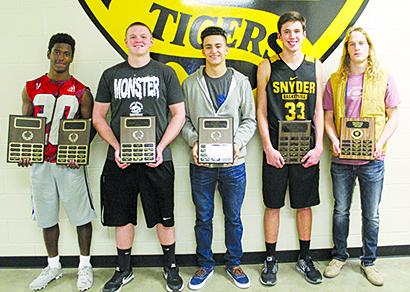 Snyder High School football players who received awards at Saturday’s banquet were (l-r) J.J. Burns, offensive most valuable player; Ben McQuirk, lineman of the year; Chris Depaz, most valuable player; Logan Greene, Fighting Tiger award; and Kabren Wills, hustle award. Not pictured is Leshun Burns, defensive most valuable player.