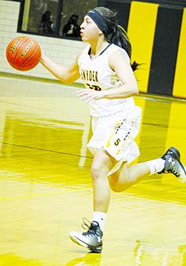 Snyder’s Allegra Escobedo dribbles down the court against Big Spring during Tuesday’s 57-31 loss.
