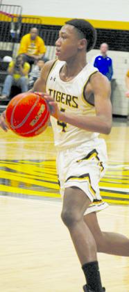 Snyder’s Alonzo Wesley drove to the basket during Monday’s 70-48 loss to Frenship at Tiger Gym.