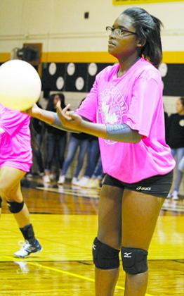 Kerrington Biggers warms up before Tuesday’s volleyball match against Sweetwater. The team wore pink T-shirts in observance of Breast Cancer Awareness Month before the match. Snyder’s Pink Out match will be Oct. 21 against Brownwood.