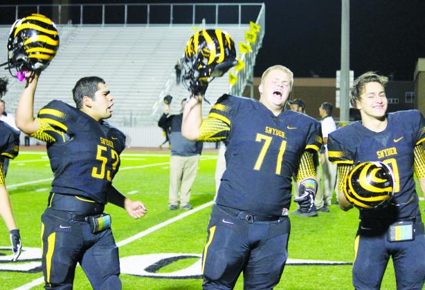 Snyder’s Paul Mata (l-r), Sean Humphrey and Chris Depaz celebrate after the Tigers defeated Stephenville on Friday. The Tigers, who are 2-0 in District 3-4A Division I, will travel to meet Wylie on Friday.