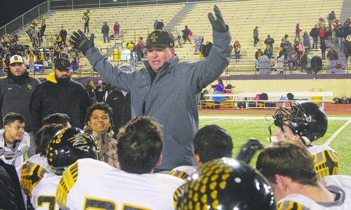 Snyder head coach Cory Mandrell talked with his players after Friday’s 56-20 win at Pecos. The Tigers will play Dalhart in a Class 4A District II bi-district playoff game at 7 p.m. Friday in Plainview. For more on Friday’s game, see Page 12A in today’s edition.
