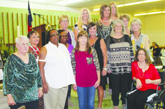 The 1980 Class 4A state volleyball champion Snyder Lady Tigers entered the Snyder Athletic Hall of Honor Friday. Team members pictured on the front row are (l-r) head coach Joyce Elrod, Shauna Pate, Lisa Cobb, Ann Melton, Kerstin Selmon, Shanna Koonsman, Toni Elrod, assistant coach Patty Grimmett and Tina Cannon. On the back row are Sabrina Robinson, Kathy Northcott, Becky Harrell, Sherri Rich and Sherry Mayes.