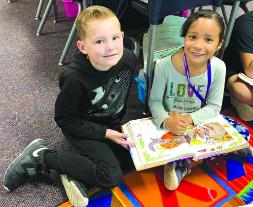 Parker Cade and Jaelynne Robles were working together on a reading activity.