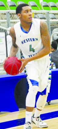 Western Texas College’s Xavier Ledet looks to pass the basketball against Frank Phillips College during Thursday’s game. Ledet scored 19 points and had 13 rebounds in the 80-74 win.