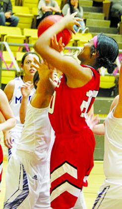 Hermleigh Aaliyah Sneed (20) draws a foul during a playoff game with Marfa in Rankin. The Lady Cardinals ended the season with a loss to O’Donnell in the Region 2-1A quarterfinals on Tuesday.