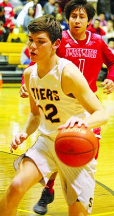 Nathan Kendrick drives to the basket during a recent game. The Tigers will play at Big Spring Friday beginning at 6:15 p.m.