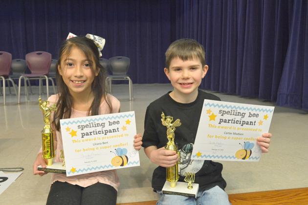 Pictured are Snyder Primary School’s 2020 second spelling bee champion Carter Madsen (right) and runner up Liliana Bert.