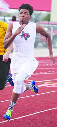  Hermleigh’s Eli Garza runs the 100-meter dash at the Wind Energy Relays. Garza finished fifth.
