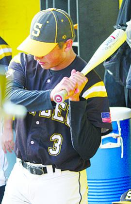 SDN Photo/Larry McCarty Snyder’s Paul V practices swinging a bat in the dugout between innings. The Tigers shut out Brownfield, 10-0