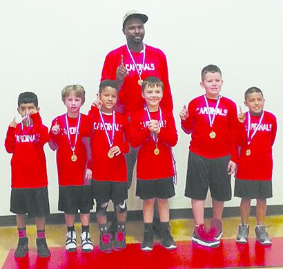 Contributed Photo The Hermleigh Cardinals first-second grade boys’ basketball team won the league and tournament championships with a record of 6-2. Pictured are (l-r) Saul Esparza, Peyton Sorrells, Zaylan Delce, coach Toby Delce, Collin Tate, Zaiden Harty and Axel Ruacho.