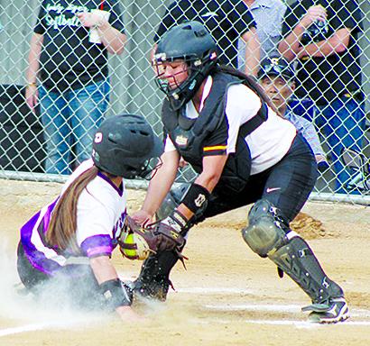 SDN Photo/Larry McCarty Snyder catcher Jasmine Montoya tags a Wylie runner at the plate during Tuesday’s 13-6 loss.