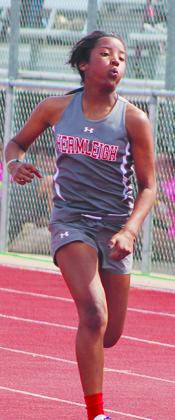 Hermleigh’s Brishaya Sneed runs to the finish line in the 100-meter dash during Monday’s Class 1A area track meet.