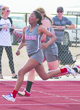 Hermleigh’s Brishaya Sneed (left) finishes ahead of teammate Kiki Gonzales in the girls’ 100-meter dash.