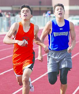 Ira’s Isaac Cabrera (left) finishes ahead of Westbrook’s Chris Chavez to win the boys’ 800-meter run at the District 12-1A track and field meet Thursday.