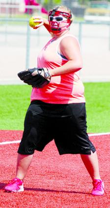 SDN Photo/Larry McCarty Hermleigh third baseman Amanda Long prepares to make a throw to first base during infield practice.