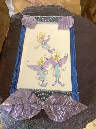 Pictured is one of the completed fairy doors.