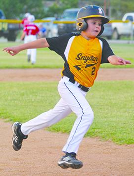 SDN Photo/Larry McCarty Snyder 11-and-under pitcher Easton Stewart runs to third base during Monday’s game against Sweetwater. Stewart allowed one hit in three innings in Snyder ’s 25-0 win at the District 5 Little League International Tournament.