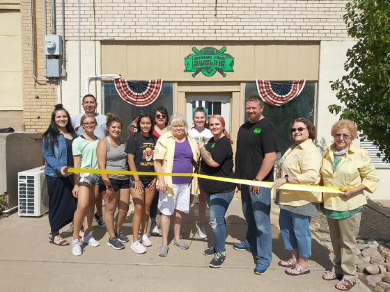 Sideline Nutrition employees and Snyder Chamber of Commerce Gold Coats members held a ribbon cutting Friday. Pictured (l-r) are Summer Grimmitt, Ryleigh Tinkler, Josh Ortegon, Alex Salinas, Jayda Villa, Sandra Salinas, Cheryl Konvicka, Makinzie Rogers, Sarah Smith, Luke Smith, Janet Spence and Nancy Smith. The business is located at 2411 Ave. R, just off the downtown square.