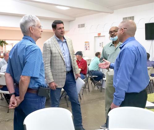 U.S. Representative Jodey Arrington, R-Lubbock, (second from left), visited Snyder Wednesday and held a town hall-style meeting at Martha Ann Woman’s Club. Arrington discussed topics ranging from the oil and gas industry and the economy to the COVID-19 pandemic. Also pictured are (l-r) Scurry County Republican Party Chairman Drew Bullard, Snyder Mayor Tony Wofford and Scurry County Judge Dan Hicks. After leaving the Women’s Club, Arrington visited Snyder’s Farmer’s Cooperative Cotton Gin.