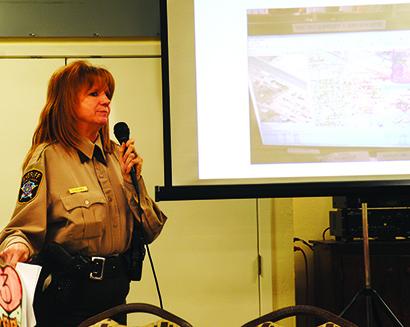 Scurry County Sheriff’s Deputy Jeanette Pritchard explained how dispatchers use maps to locate an emergency call during a presentation at the Scurry County Senior Citizens Center Thursday. 