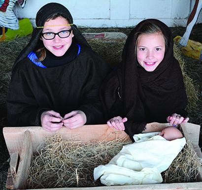 Emma Thurman was Joseph and Brooklyn O’Quinn was Mary during a live Nativity scene for the Ye Olde Village Lighting ceremony at the Heritage Village. The scene was provided by First United Methodist Church.