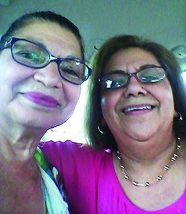 Hilda Guzman of Snyder (right) was reunited with her sister, Magda Wall of Hookstown, Penn, for the first time in 40 years.