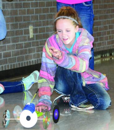 Ira ISD sixth grade student Avery Schiffner and her classmates raced mouse trap cars Tuesday. The project was organized by science teacher Pam Herring.