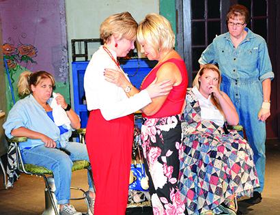 Pictured are (l-r) Stacey Haley, Erin Lowery, Nancy Harris, Cassie Cochran and Jeri Speegle rehearsing a scene from Steel Magnolias, which opens at 7 p.m. Thursday at the Ritz Community Theatre. The comedy will also be staged at 7 p.m. Friday and Saturday and 2 p.m. Sunday. Tickets are $10 and may be reserved by calling 573-5061.
