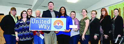 Agencies supported by the Scurry County United Way campaign received allotment checks during Tuesday’s Scurry County United Way campaign awards luncheon. Pictured are (l-r) Robert Swiney, Snyder We Care; Amanda McKee, Cancer Services Network; Brad Bawcum, Snyder Fire Department; Sonny Greenfield, Scurry County Food Cupboard; Zachary Mullins, Buffalo Trail Boy Scouts; Kazual Moore, Gateway Family Services; Krystal Martinez, West Texas Children’s Advocacy Center; C.C. Garrison, Janel Roden and Susan Rios, Scu