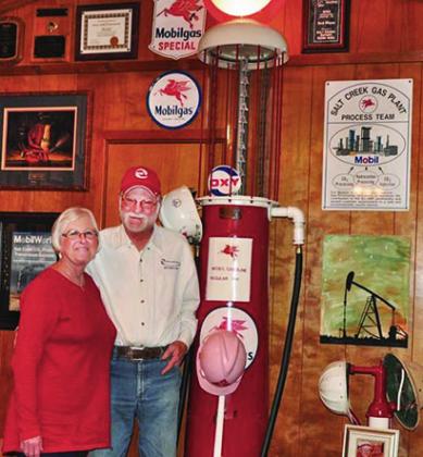 Susie and Doug White of Ira are pictured with some of the oil business memorabilia he collected during his 40 years of employment.