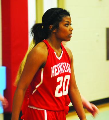 Hermleigh High School students Aaliyah Sneed (shown here) and Brishaya Sneed participate in several activities at the school, including playing for the girls’ basketball team. After most basketball games, they cheer on the boys’ team.